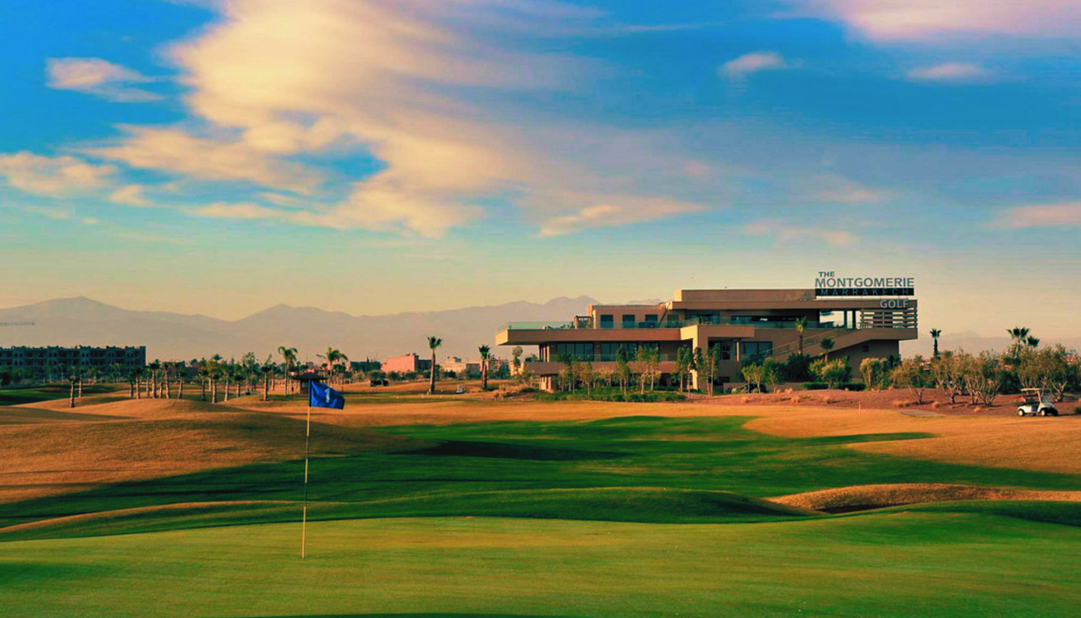 Clubhouse and terrace of a Marrakech golf course at sunset