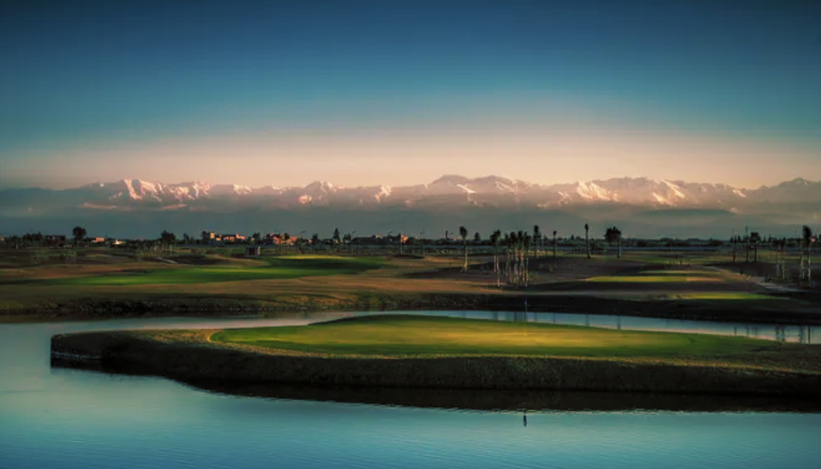 Lake and fairway with the Atlas peaks on the horizon