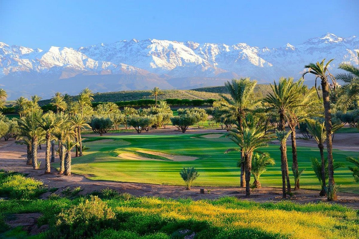 Marrakech golf fairway with the snow-capped High Atlas peaks in winter